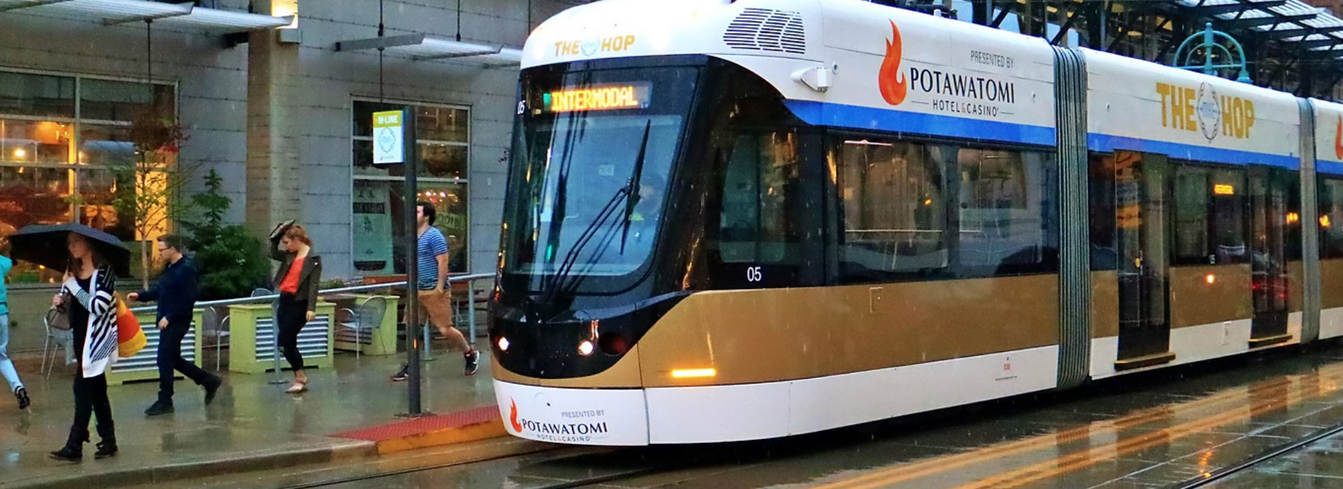 A streetcar parked at a station